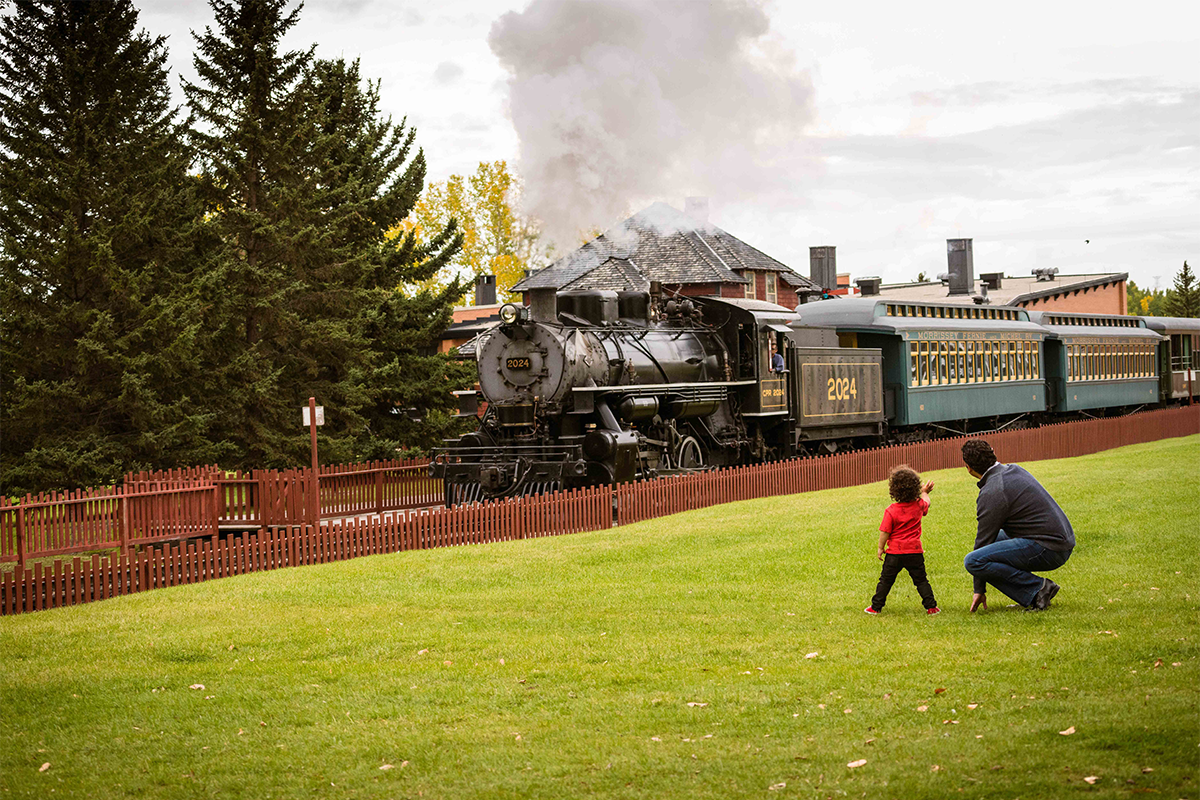Heritage Park - family looking at the train
