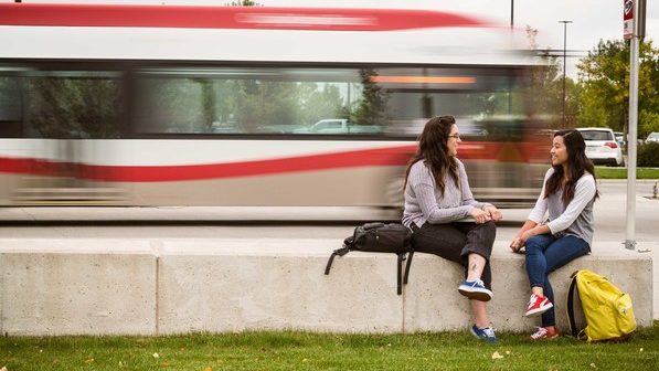Transit riders waiting for their bus